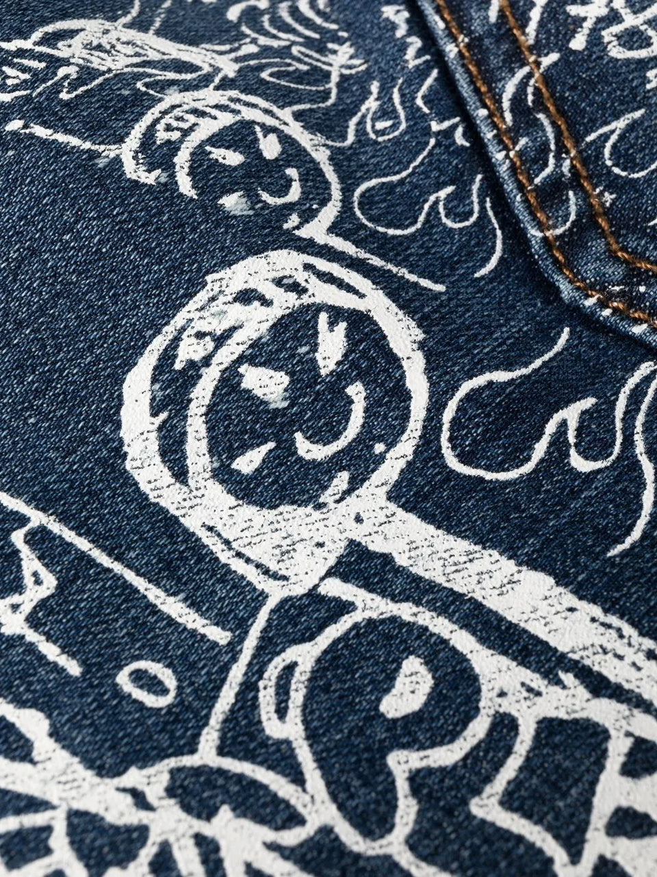 all-over graphic-print jeans