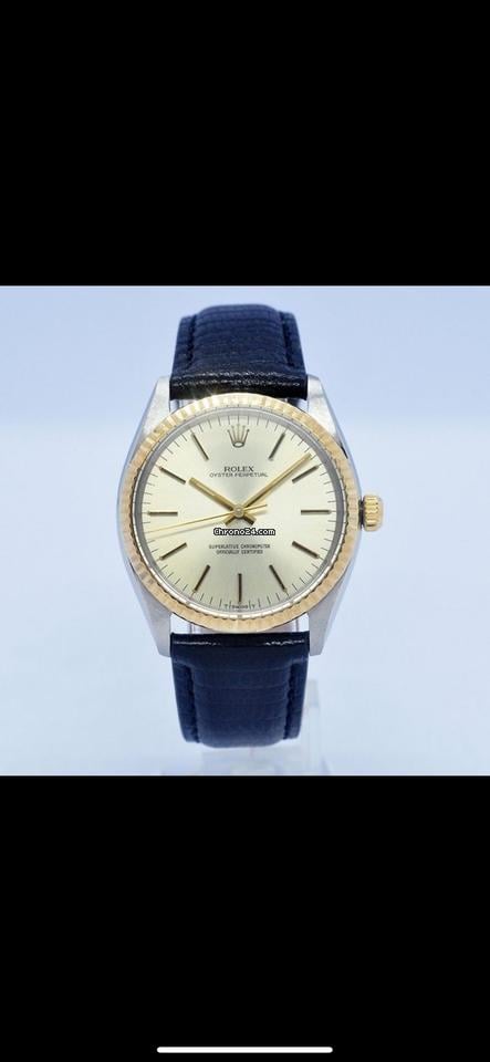 Rolex | Oyster Perpetual | 1005 | Steel | 33 mm | Leather | Gold | Automatic
