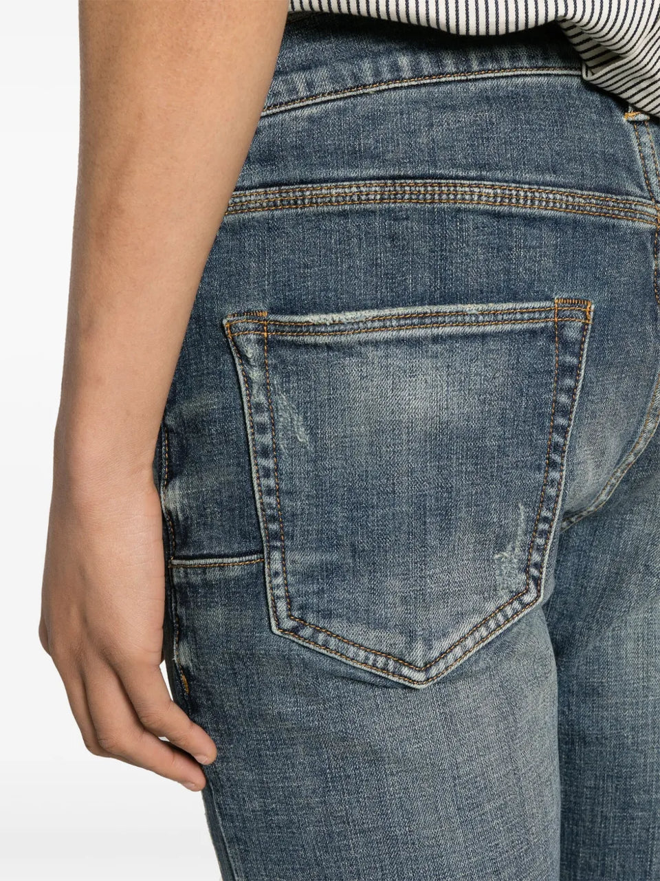 P004 low-rise flared jeans