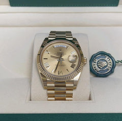 Rolex | Day-Date | 228238 | Yellow gold | 40 mm | Yellow gold | Champagne | Automatic