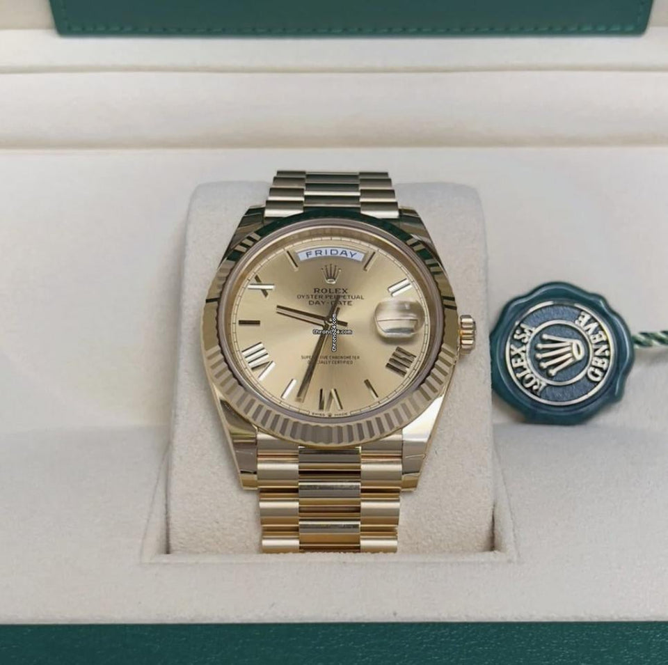 Rolex | Day-Date | 228238 | Yellow gold | 40 mm | Yellow gold | Champagne | Automatic