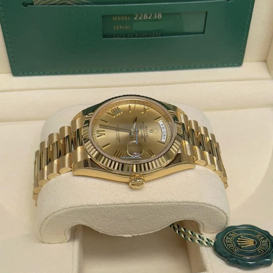 Rolex | Day-Date | 228238 | Yellow gold | 40 mm | Yellow gold | Champagne | Automatic