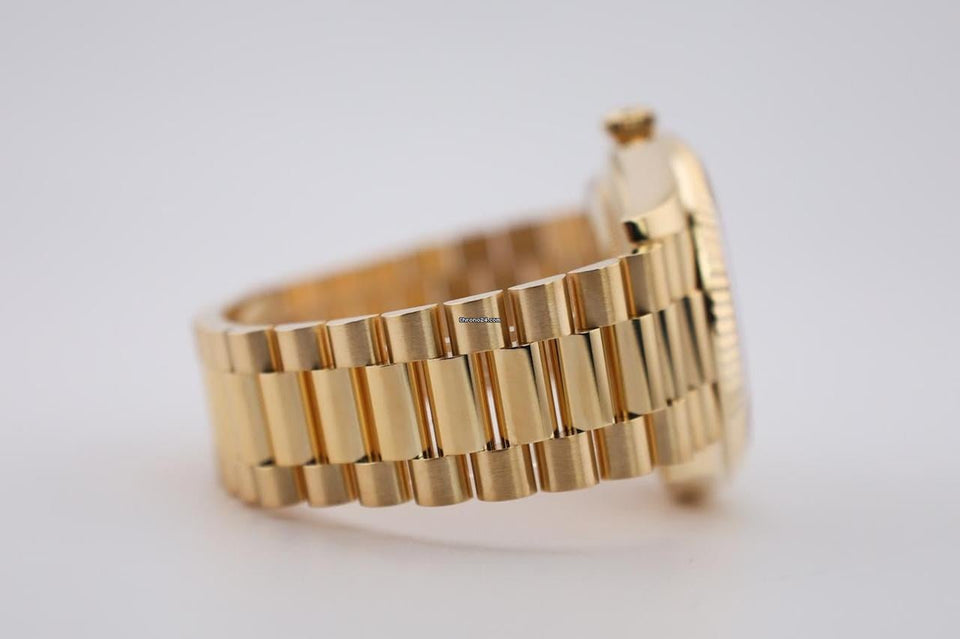 Rolex | Day-Date | 228238-0006 | Yellow gold | 40 mm | Yellow gold | Champagne | Automatic