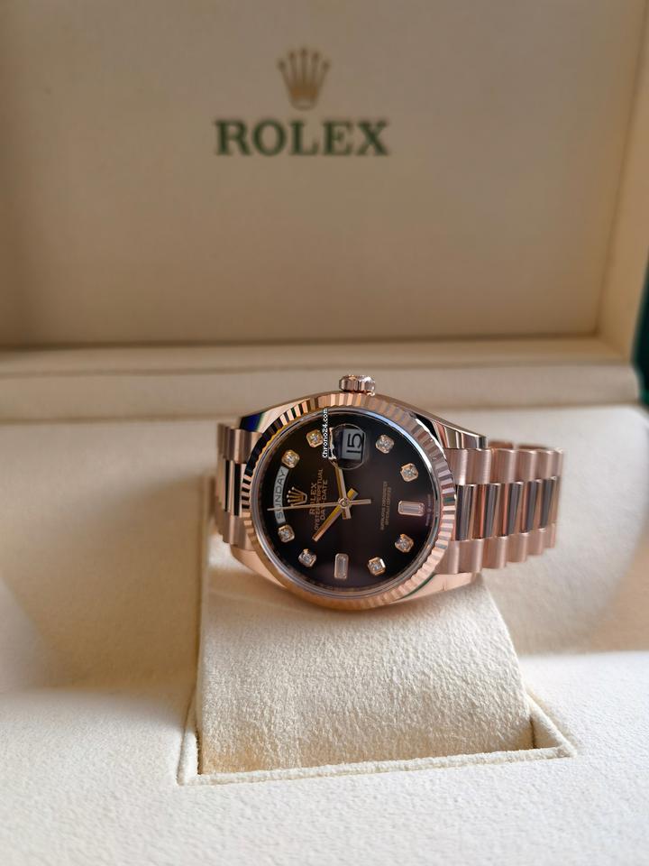 Rolex | Day-Date | 128235-0038 | Rose gold | 36 x 43 mm | Rose gold | Brown | Automatic