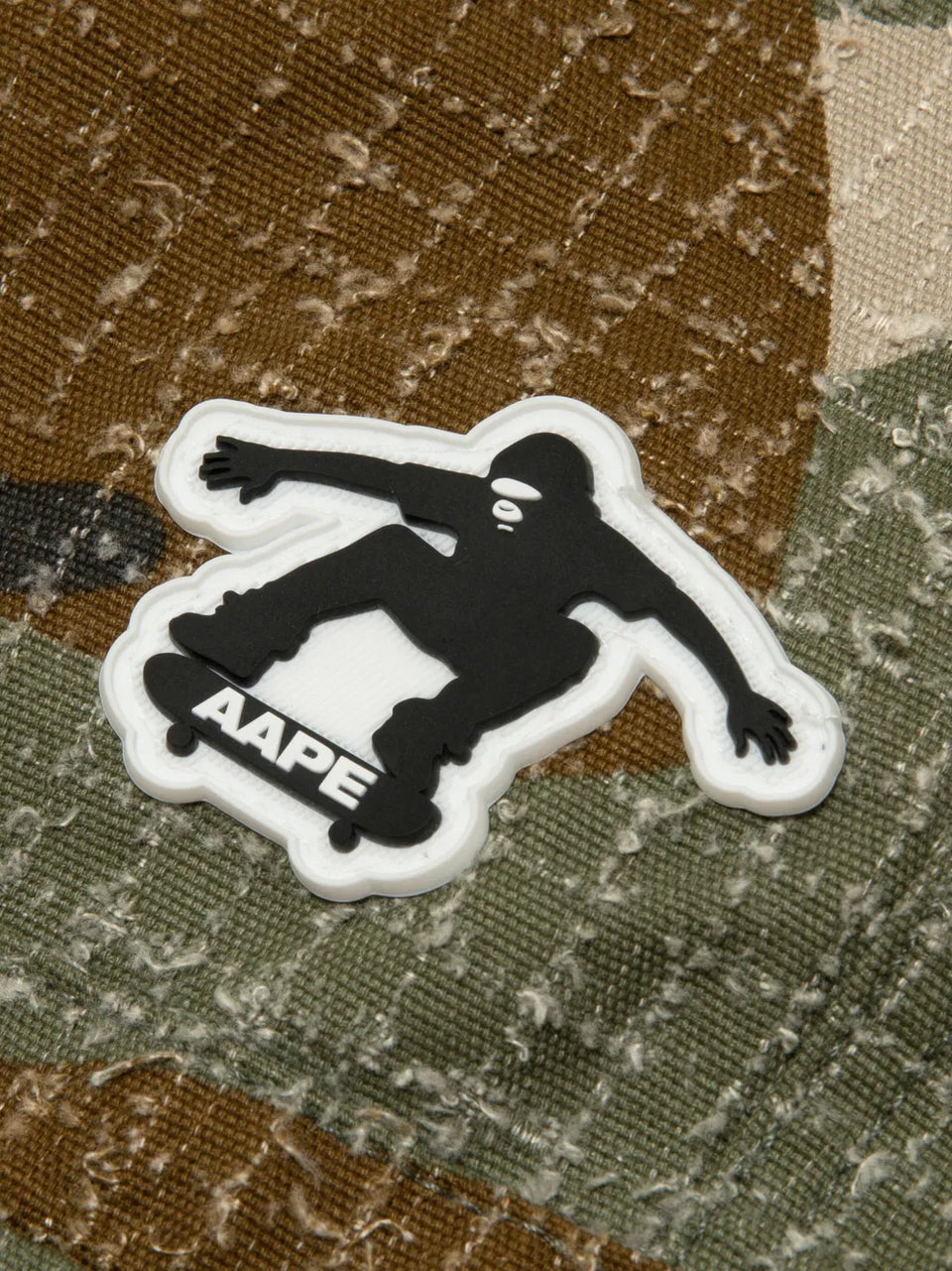 camouflage print trousers