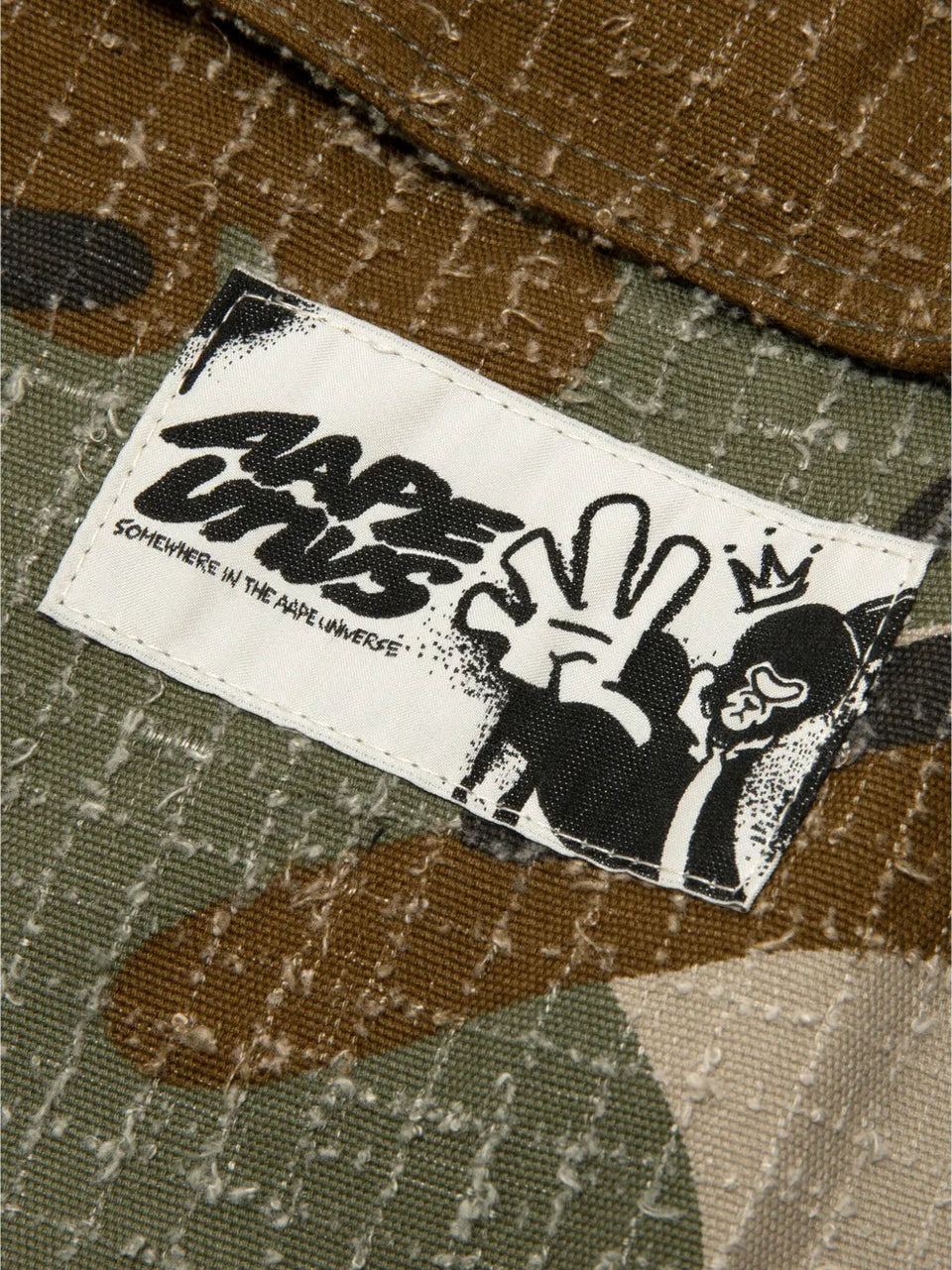 camouflage print trousers