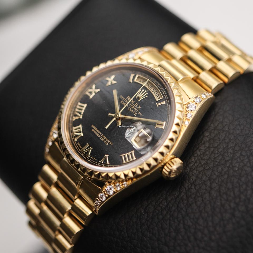 Rolex | Day-Date | 18018 | Yellow gold | 36 mm | Yellow gold | Black | Automatic
