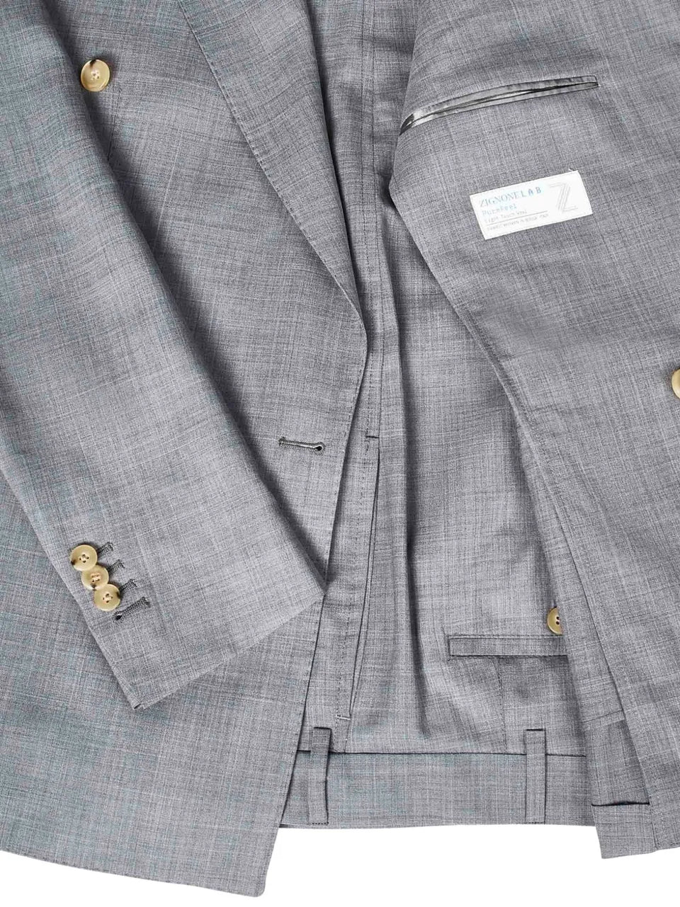 double-breasted peak-lapel suit