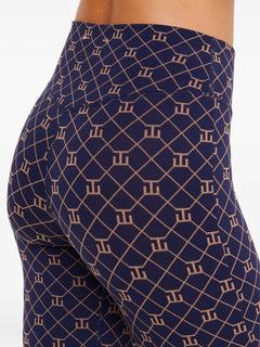 Ezra geometric-print trousers
