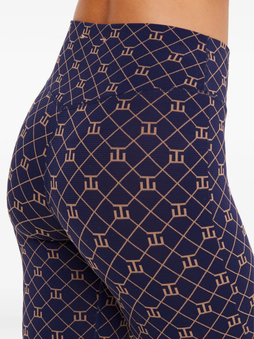 Ezra geometric-print trousers