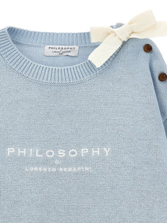 bow-buttoned sweater