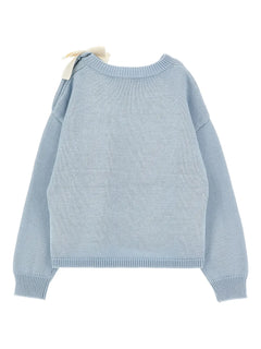 bow-buttoned sweater