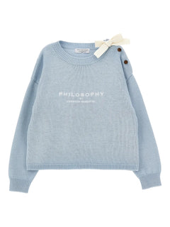 bow-buttoned sweater