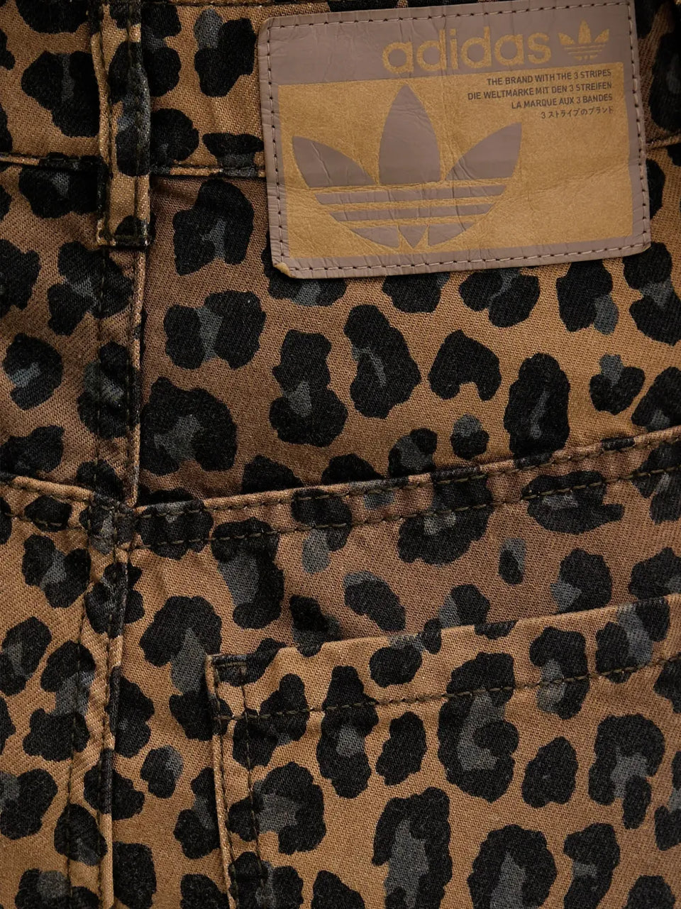leopard-print striped jeans