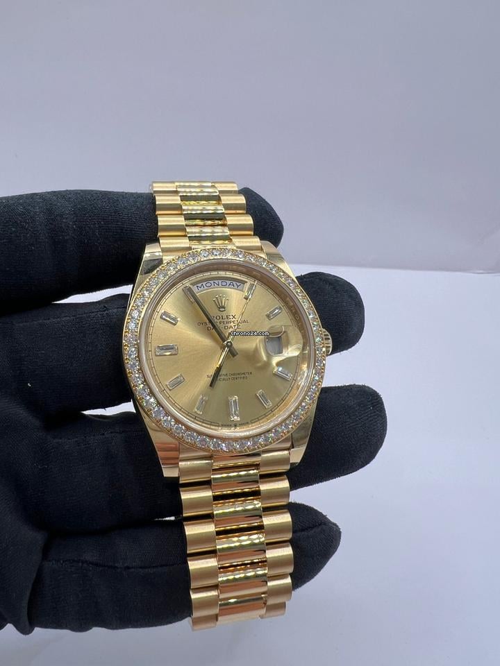 Rolex | Day-Date | 228348RBR | Yellow gold | 40 x 48 mm | Yellow gold | Gold | Automatic