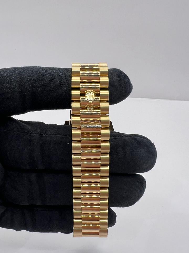 Rolex | Day-Date | 228348RBR | Yellow gold | 40 x 48 mm | Yellow gold | Gold | Automatic