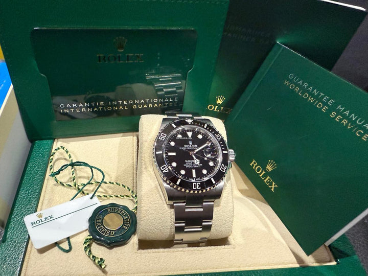 Rolex | Submariner | 16610 | Steel | 30 mm | Steel | Black | Automatic