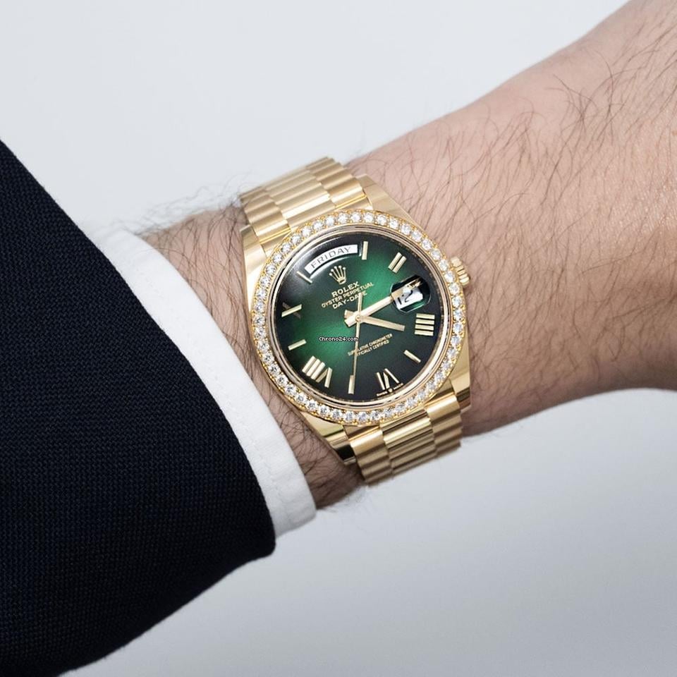 Rolex | Day-Date | 228348RBR | Yellow gold | 40 mm | Yellow gold | Green | Automatic