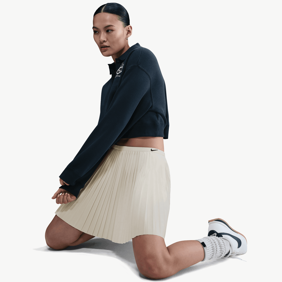 NIKE PLEATED SKIRT { WHITE