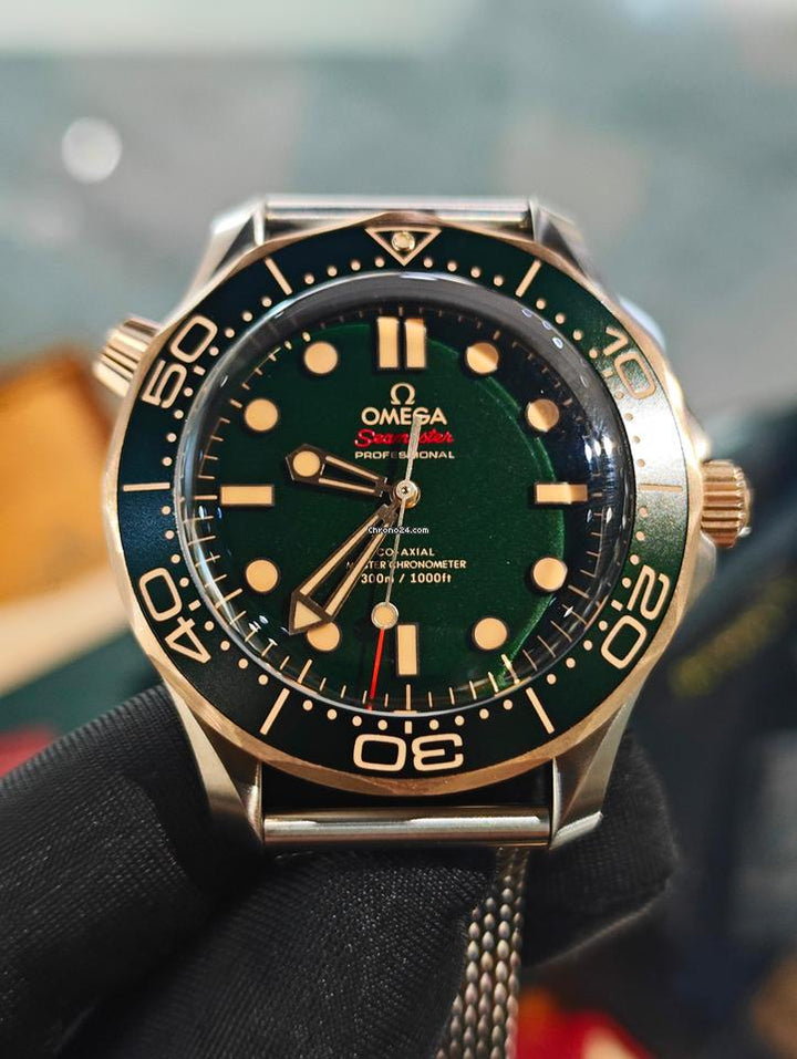 Omega Seamaster Diver 300 MBasel one Seamaster Diver 300m Titanium Bronze Gold Meshgreen titan strap 5 years international warranty