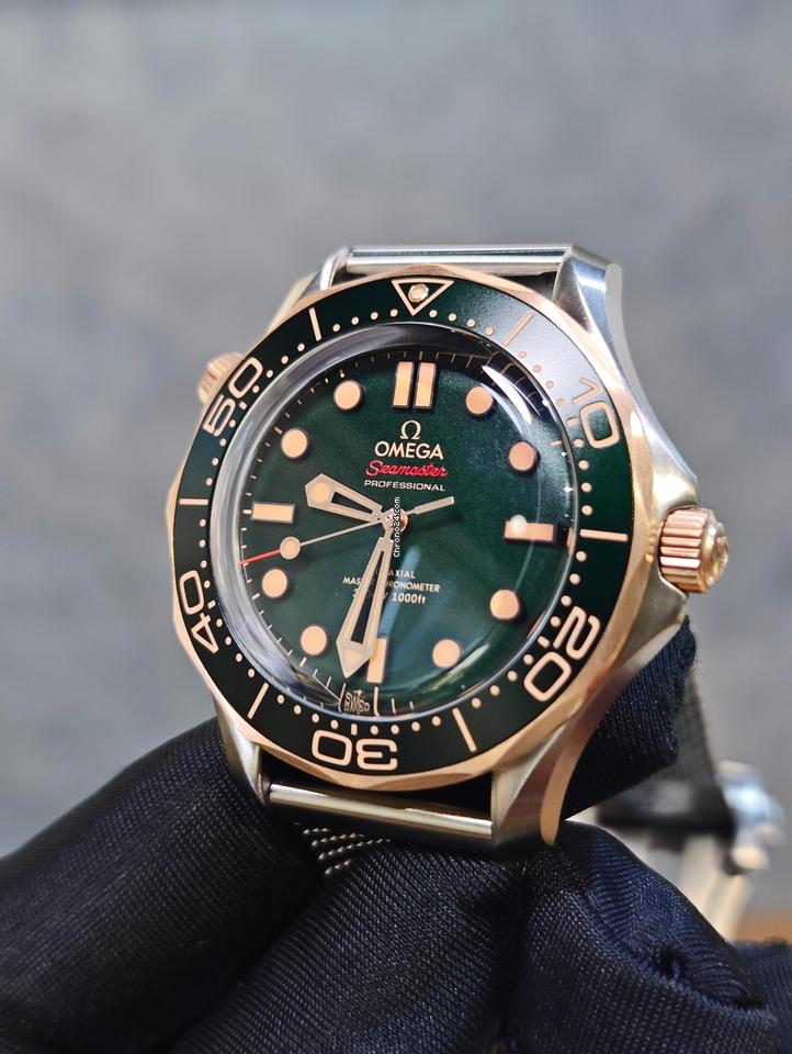 Omega Seamaster Diver 300 MBasel one Seamaster Diver 300m Titanium Bronze Gold Meshgreen titan strap 5 years international warranty