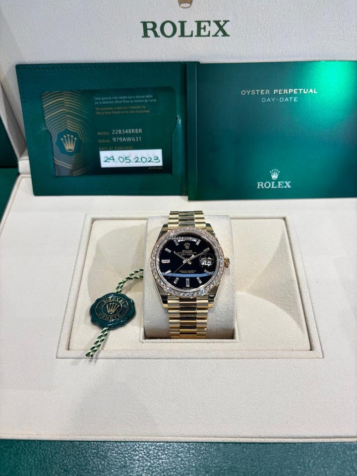 Rolex | Day-Date | 228348RBR | Yellow gold | 40 mm | Yellow gold | Black | Automatic