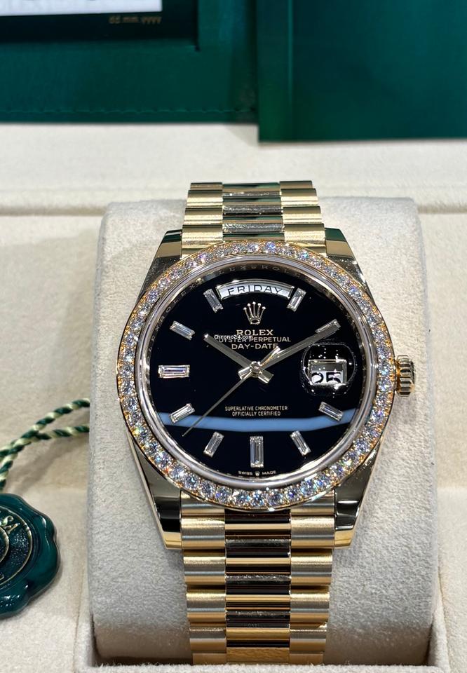 Rolex | Day-Date | 228348RBR | Yellow gold | 40 mm | Yellow gold | Black | Automatic