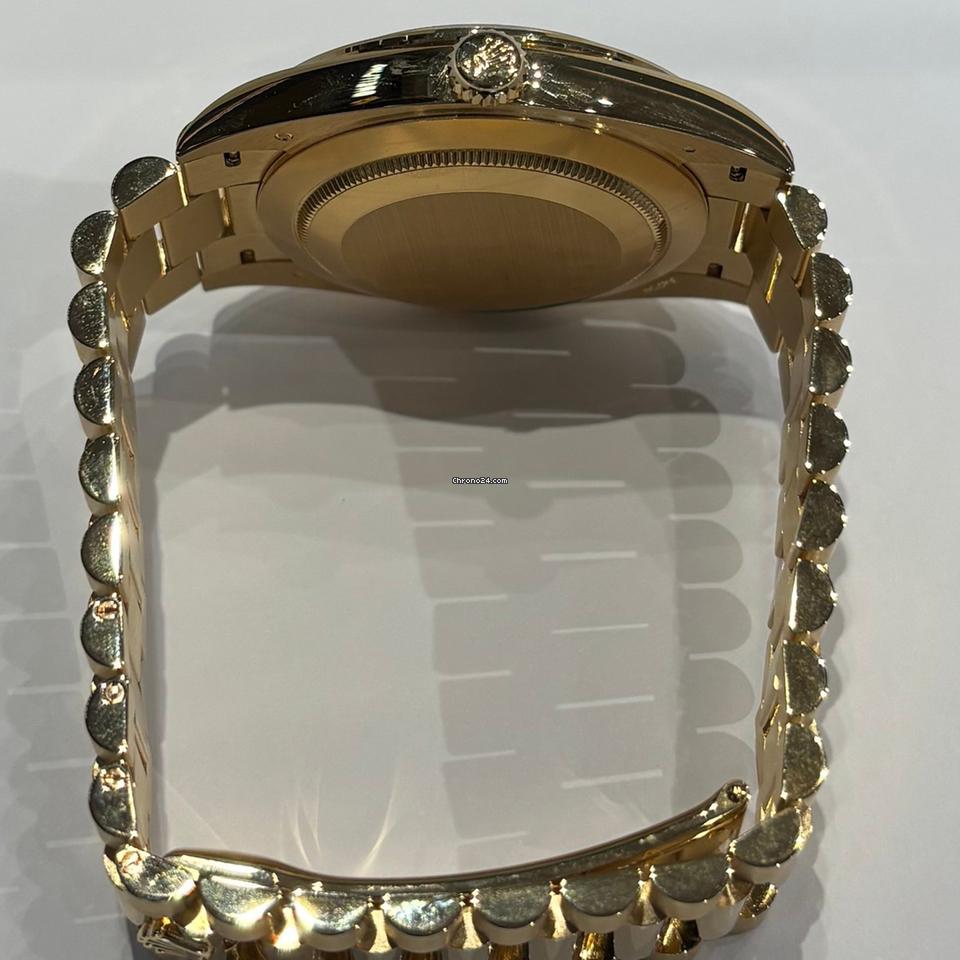 Rolex | Day-Date | 228348RBR | Yellow gold | 40 mm | Yellow gold | Black | Automatic