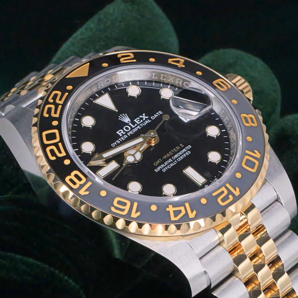 Rolex | GMT-Master II | 126713grnr | Yellow gold | 40 mm | Gold/Steel | Black | Automatic