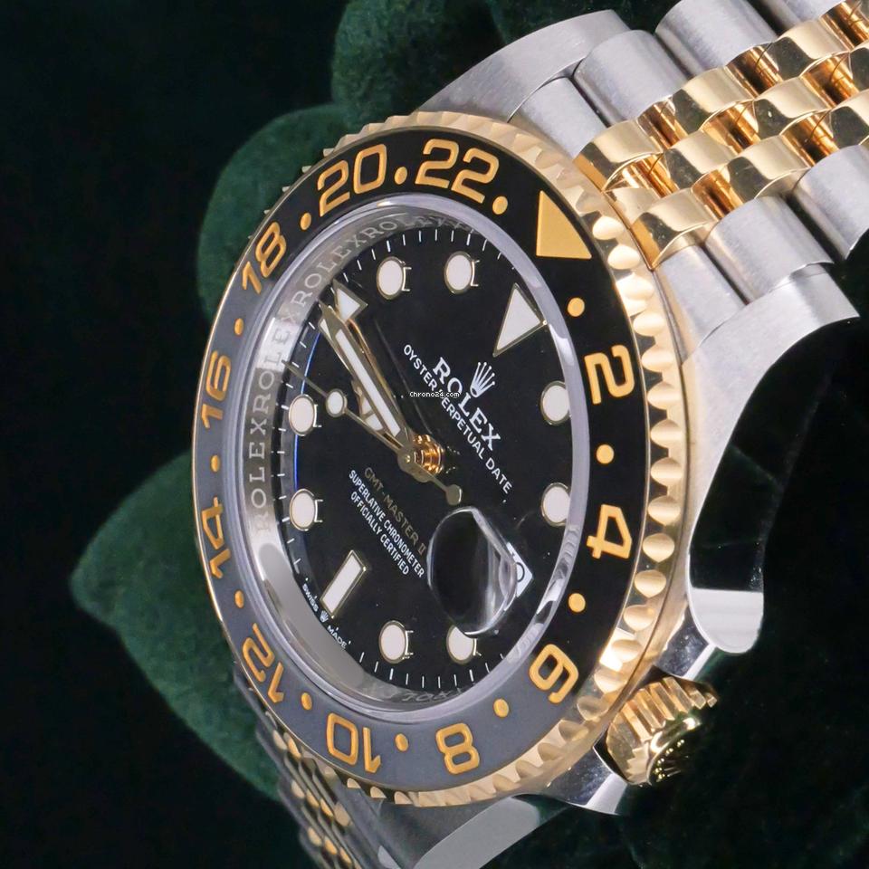 Rolex | GMT-Master II | 126713grnr | Yellow gold | 40 mm | Gold/Steel | Black | Automatic