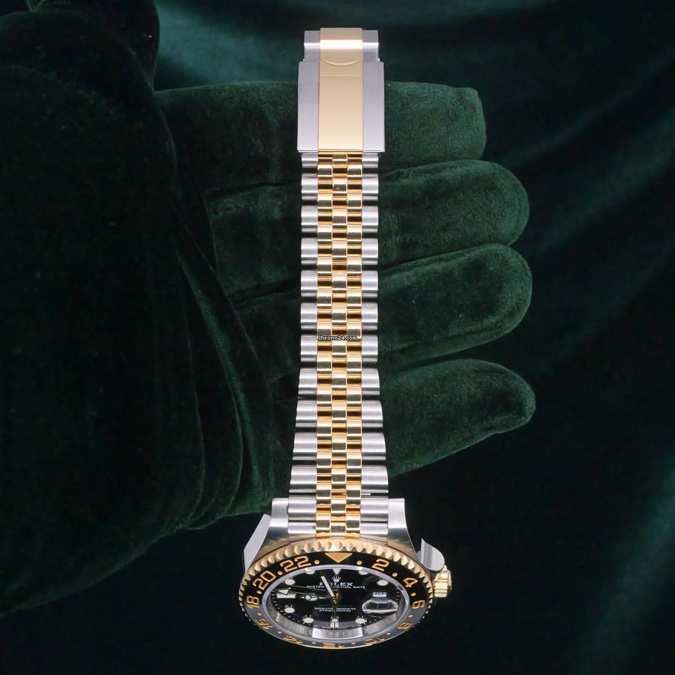 Rolex | GMT-Master II | 126713grnr | Yellow gold | 40 mm | Gold/Steel | Black | Automatic