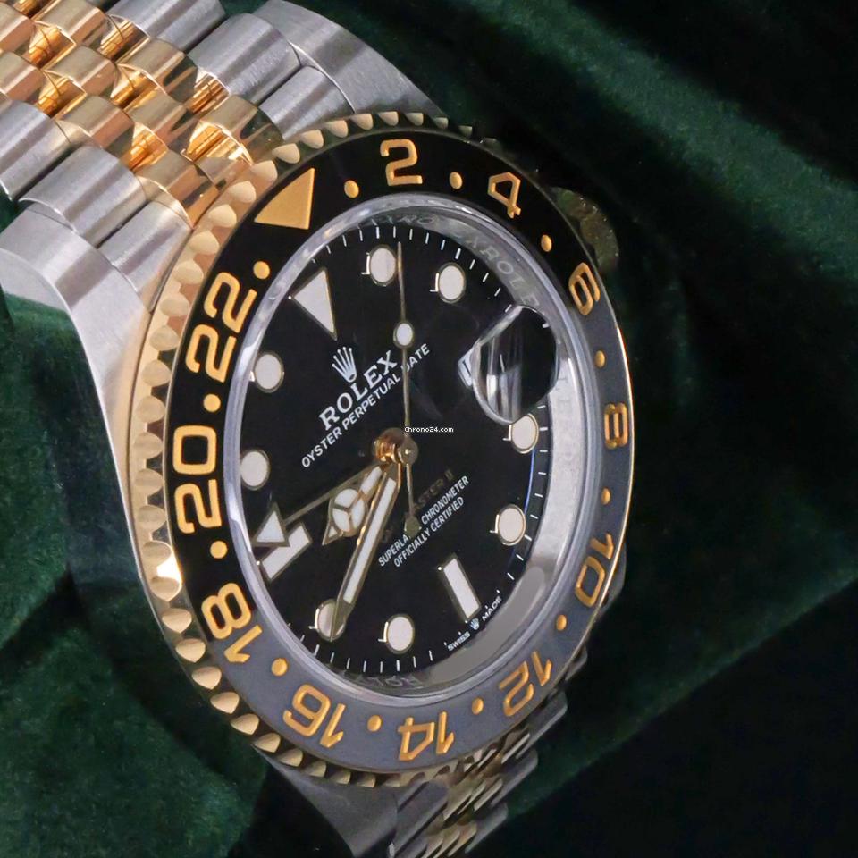 Rolex | GMT-Master II | 126713grnr | Yellow gold | 40 mm | Gold/Steel | Black | Automatic