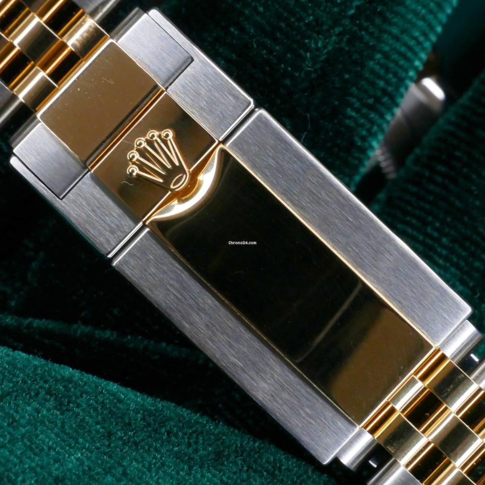 Rolex | GMT-Master II | 126713grnr | Yellow gold | 40 mm | Gold/Steel | Black | Automatic