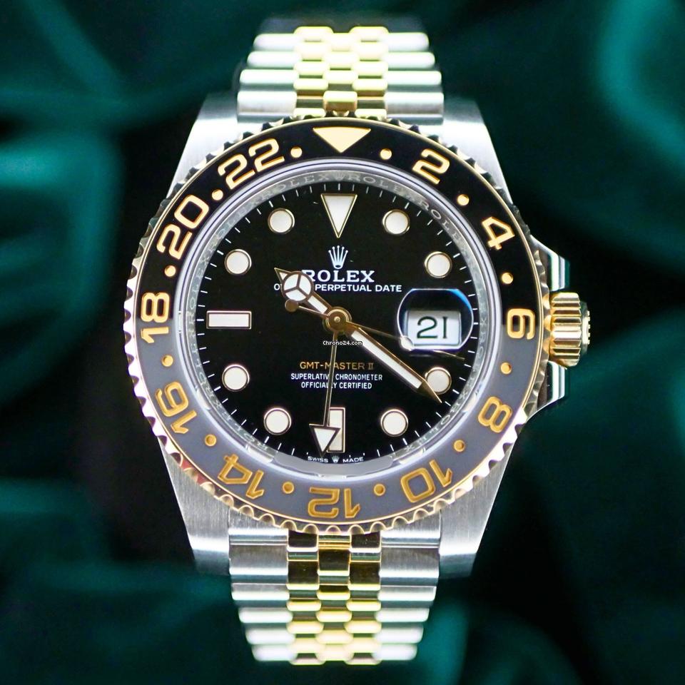 Rolex | GMT-Master II | 126713grnr | Yellow gold | 40 mm | Gold/Steel | Black | Automatic