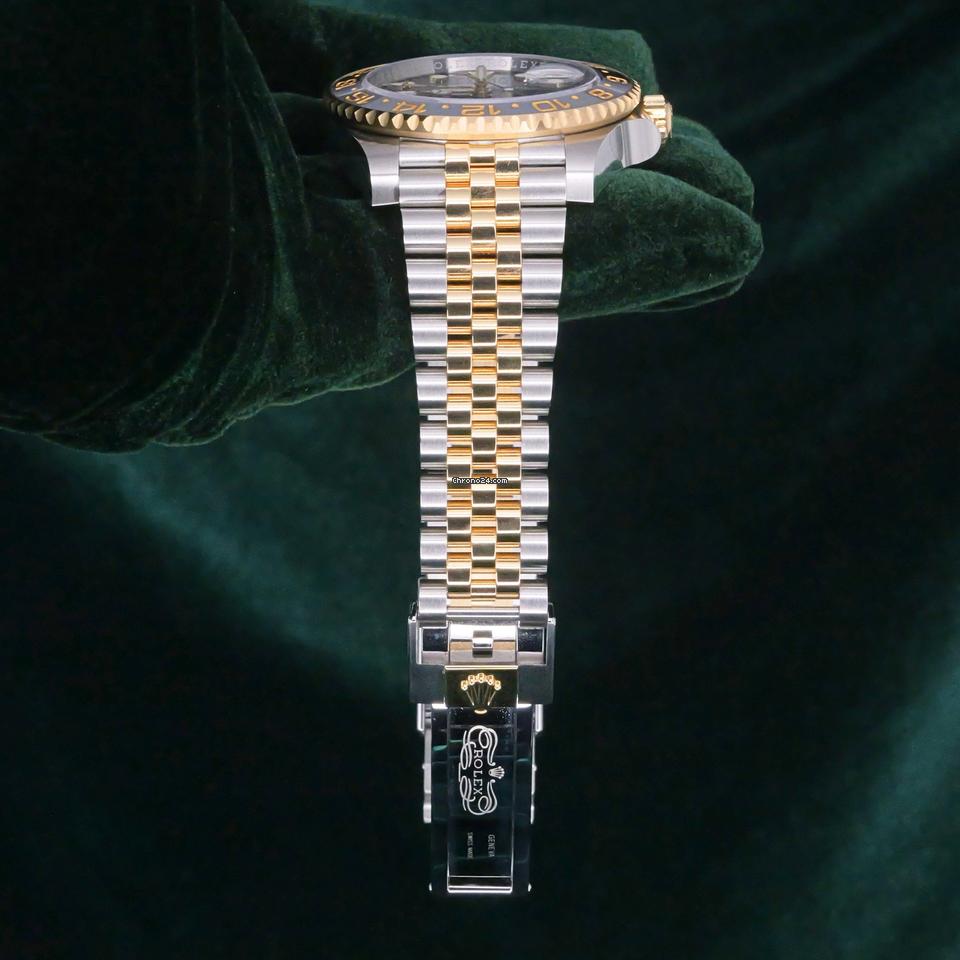 Rolex | GMT-Master II | 126713grnr | Yellow gold | 40 mm | Gold/Steel | Black | Automatic