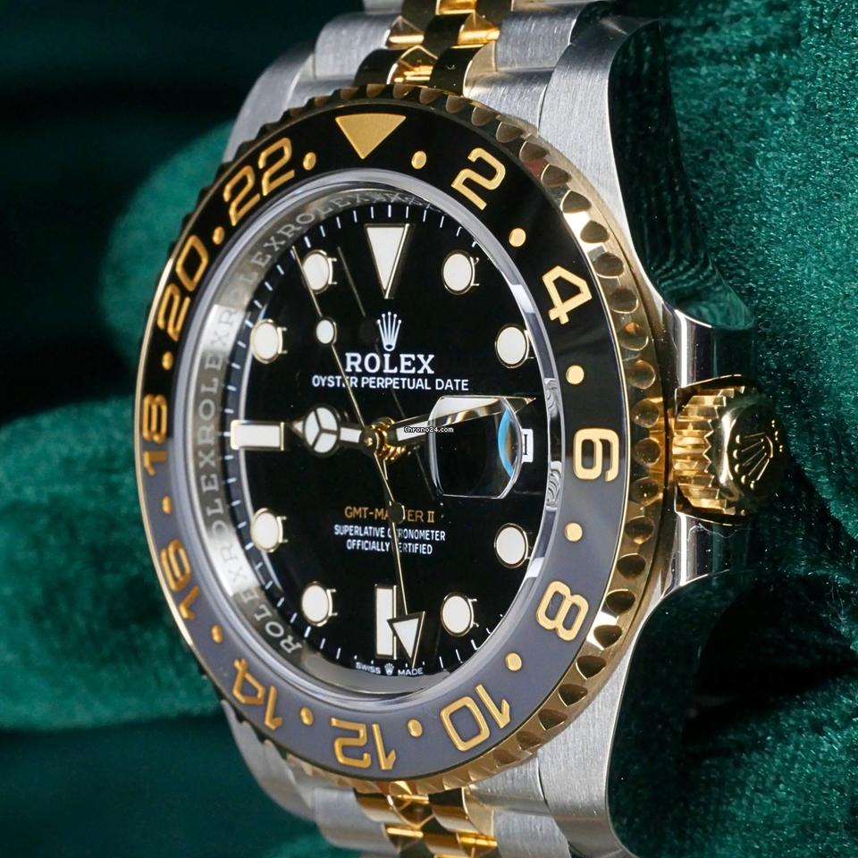 Rolex | GMT-Master II | 126713grnr | Yellow gold | 40 mm | Gold/Steel | Black | Automatic