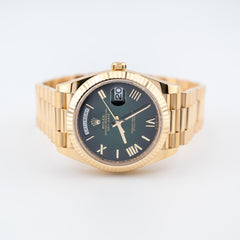 Rolex | Day-Date | 228238 | Yellow gold | 40 mm | Yellow gold | Green | Automatic