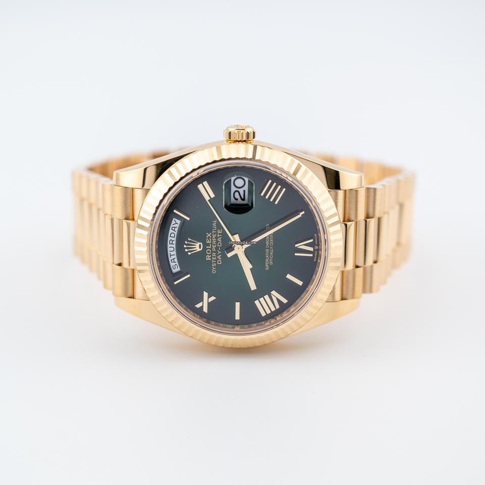 Rolex | Day-Date | 228238 | Yellow gold | 40 mm | Yellow gold | Green | Automatic