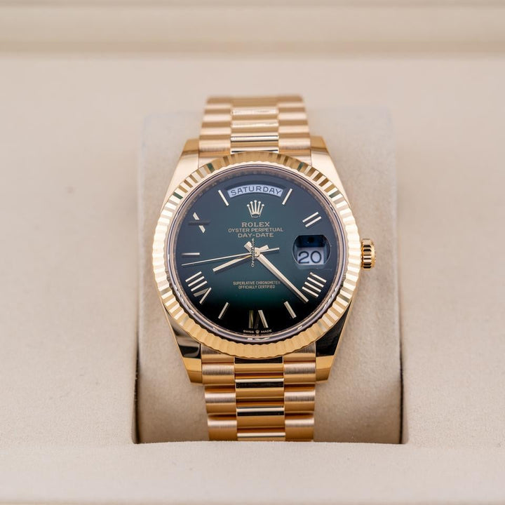 Rolex | Day-Date | 228238 | Yellow gold | 40 mm | Yellow gold | Green | Automatic