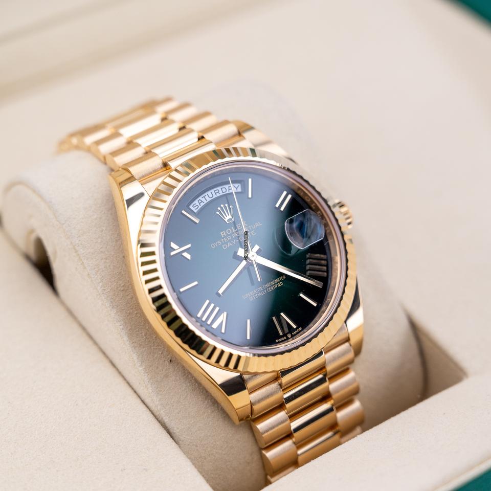 Rolex | Day-Date | 228238 | Yellow gold | 40 mm | Yellow gold | Green | Automatic