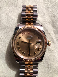 Rolex Oyster Perpetualyear 2009. Vintage. 18k gold. Stamps of authenticity.