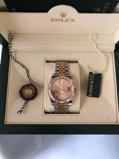 Rolex Oyster Perpetualyear 2009. Vintage. 18k gold. Stamps of authenticity.