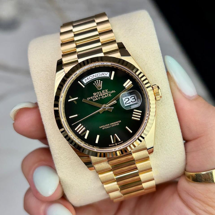 Rolex | Day-Date | 128238 | Yellow gold | 36 x 43 mm | Yellow gold | Green | Automatic
