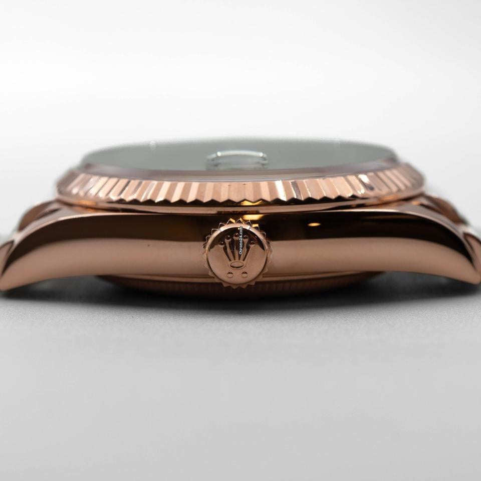 Rolex | Day-Date | 128235 | Rose gold | 36 x 43 mm | Rose gold | White | Automatic