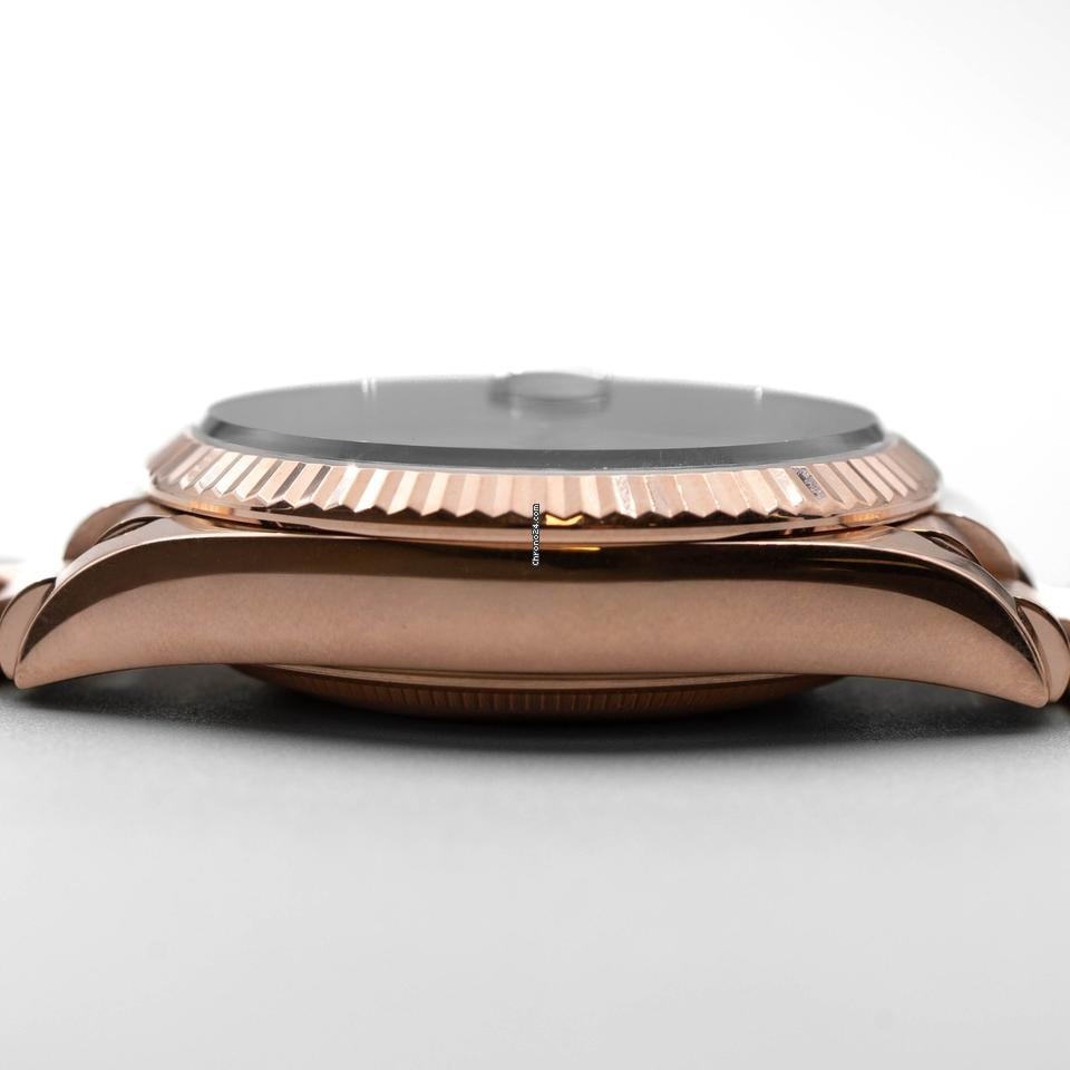 Rolex | Day-Date | 128235 | Rose gold | 36 x 43 mm | Rose gold | White | Automatic