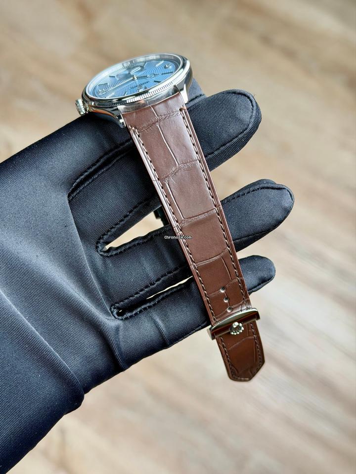 Rolex | 1908 | 52506 | Platinum | 39 x 41 mm | Leather | Blue | Automatic