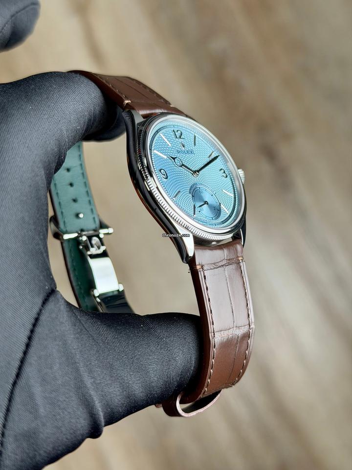 Rolex | 1908 | 52506 | Platinum | 39 x 41 mm | Leather | Blue | Automatic