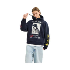 Coach Dinosaur Collage Relaxed Hoodie In Organic Cotton in Navy Blue