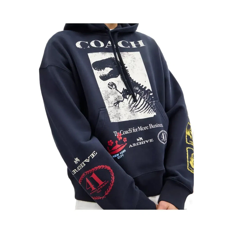Coach Dinosaur Collage Relaxed Hoodie In Organic Cotton in Navy Blue