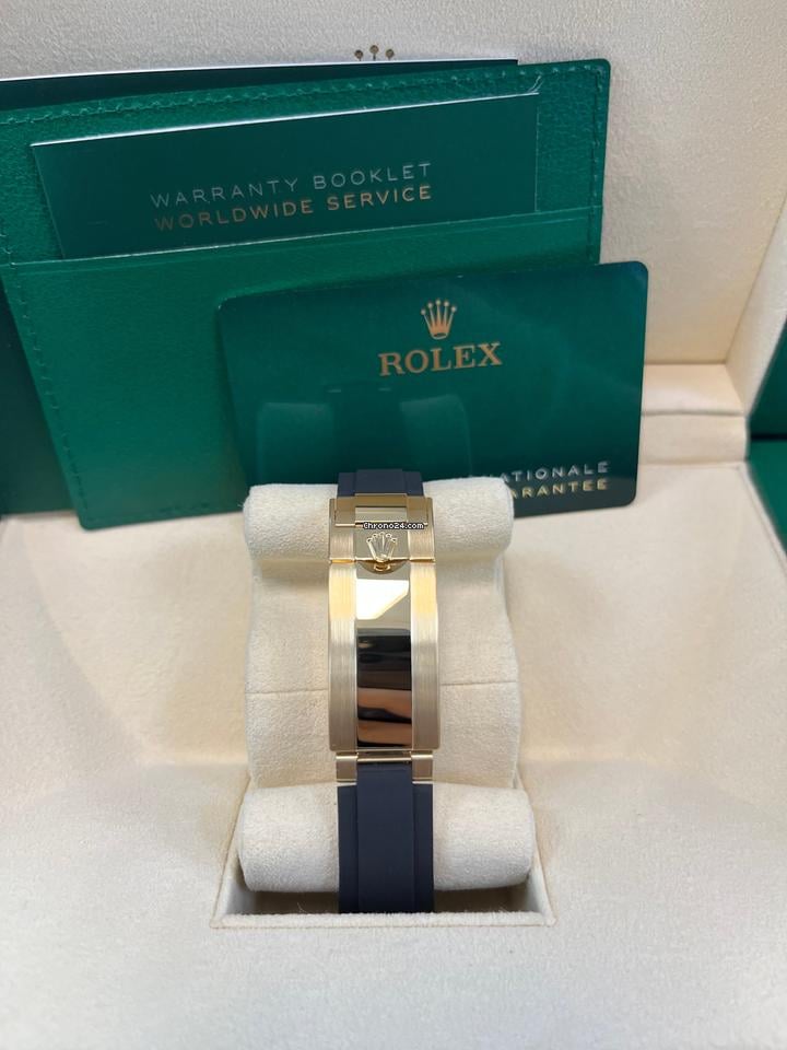 Rolex | Daytona | 126518 | Yellow gold | 40 mm | Rubber | Turquoise | Automatic